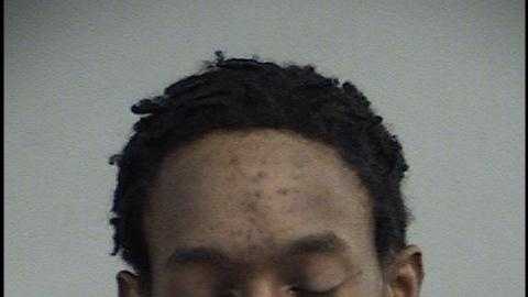 Police: Burglar hides behind Christmas tree as officers arrive