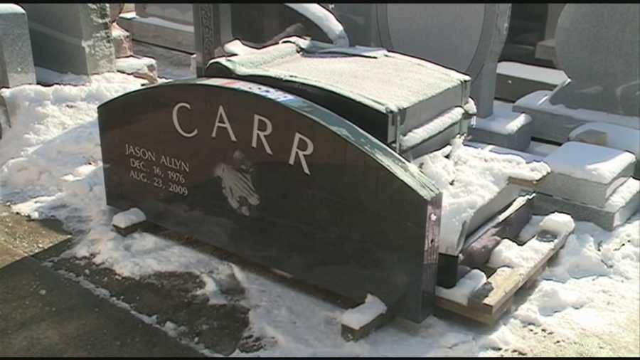 An Indiana woman has the bodies of her husband and son exhumed after a dispute with a cemetery over their headstone.