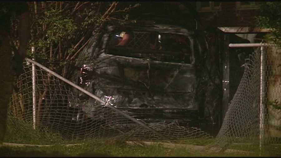 A stolen vehicle crashed through a fence and into an above ground pool early Friday morning and burst into flames.