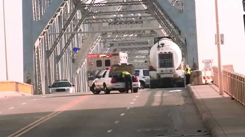 Police say a woman was struck and killed while trying to cross the base of the Clark Memorial Bridge just before 8 a. m. Thursday.