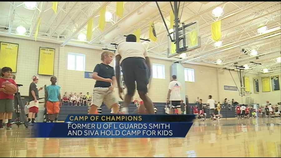 Peyton Siva and Russ Smith held a basketball camp for kids.