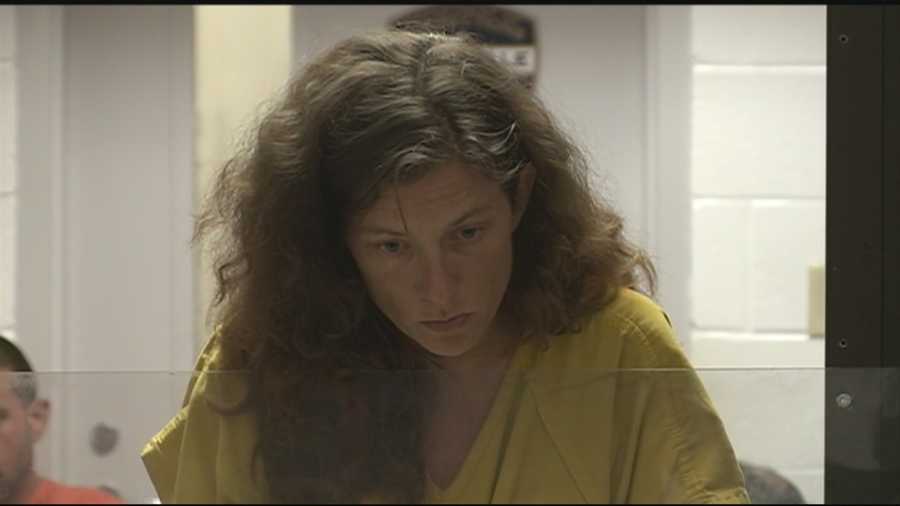 Woman accused of trying to strangle 8-year-old son