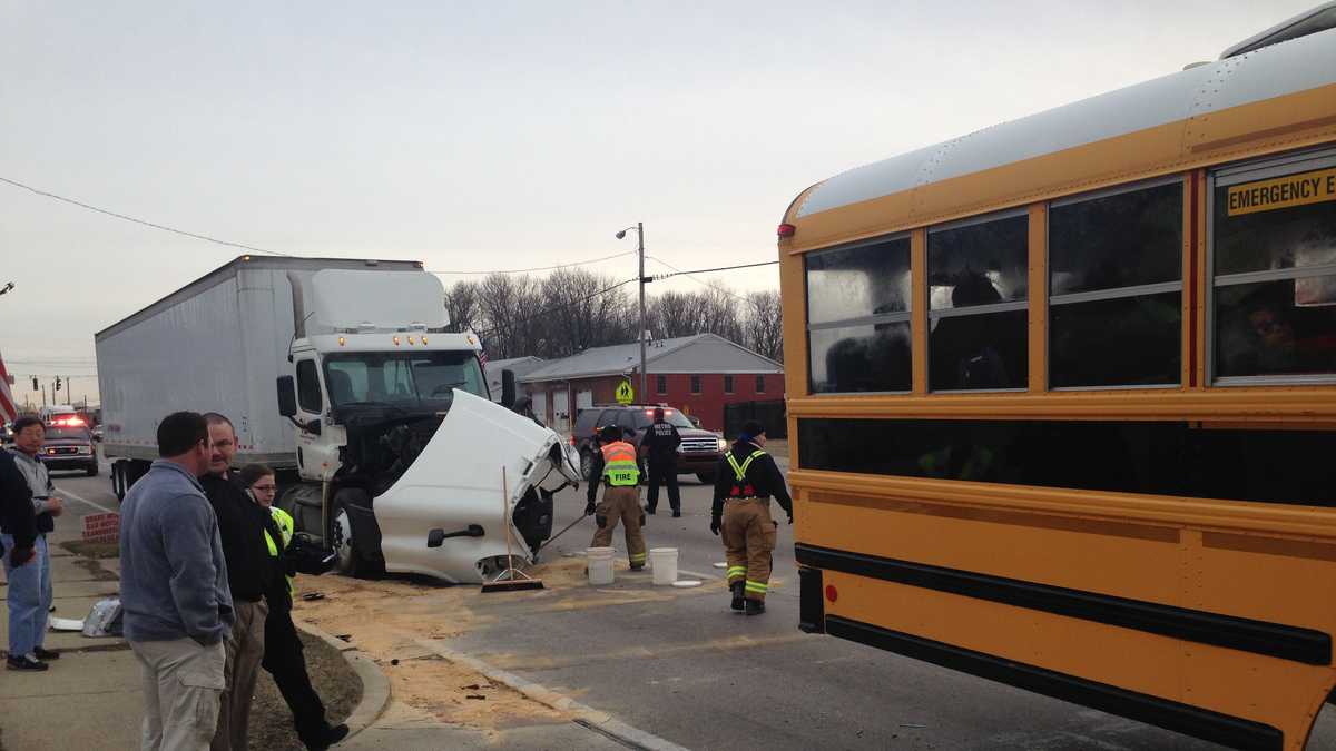 20 students taken to hospital after crash involving bus, semi, police ...