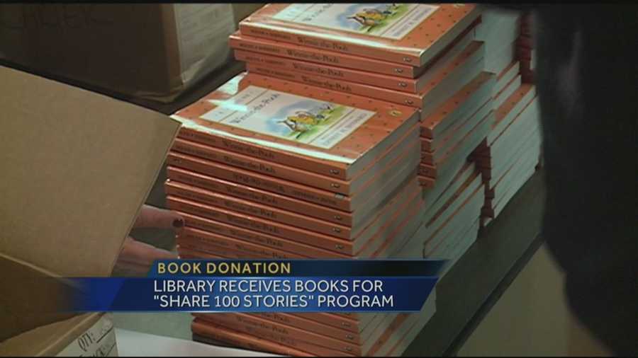 A library received books for "Share 100 Stories" program.