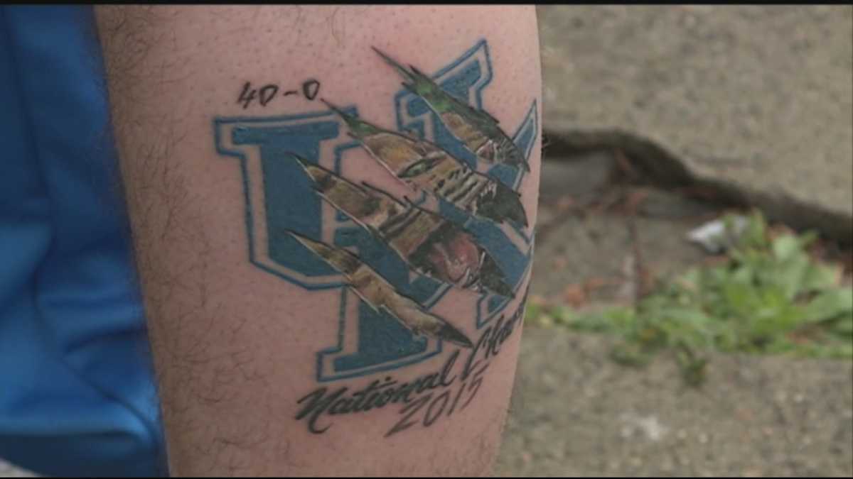 Louisville fan celebrates Louisville with the biggest head tattoo