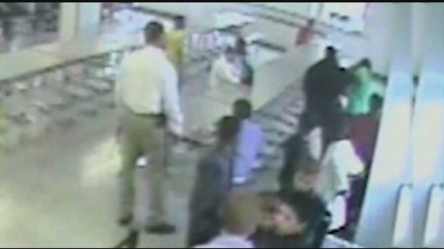 Newly released surveillance video appears to show a former Jefferson County Public Schools resource officer hitting a student.