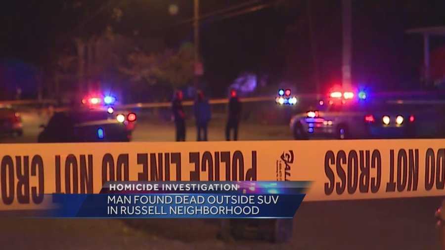 The investigation continues after a man was found dead outside an SUV in the Russell neighborhood.