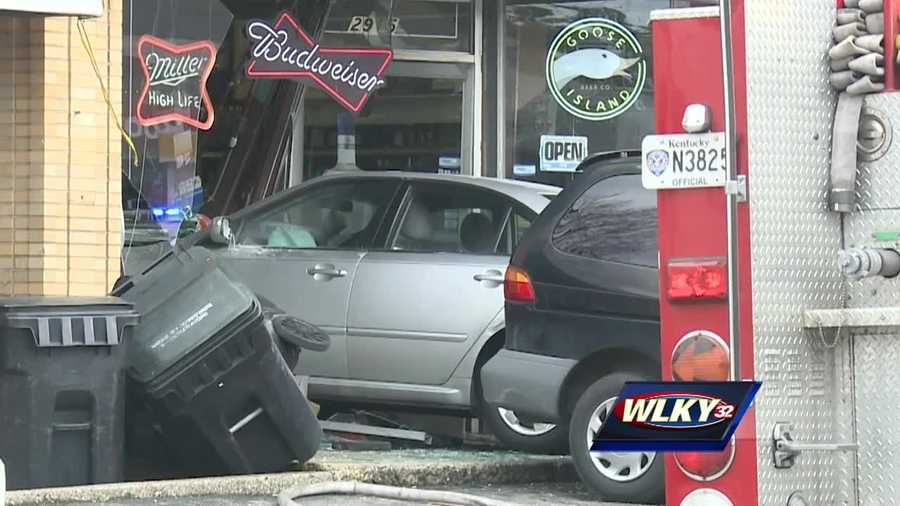 A car crashes through a liquor store Thursday morning in the 2900 block of Brownsboro Road.
