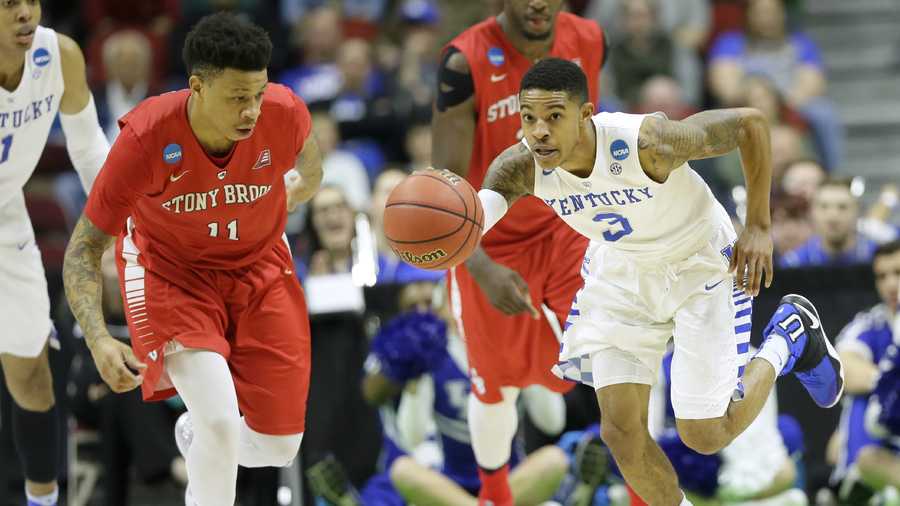Kentucky guard Tyler Ulis drives upcourt past Stony Brook forward Rayshaun McGrew, left, during the first half of a first-round men's college basketball game in the NCAA Tournament, Thursday, March 17, 2016, in Des Moines, Iowa.