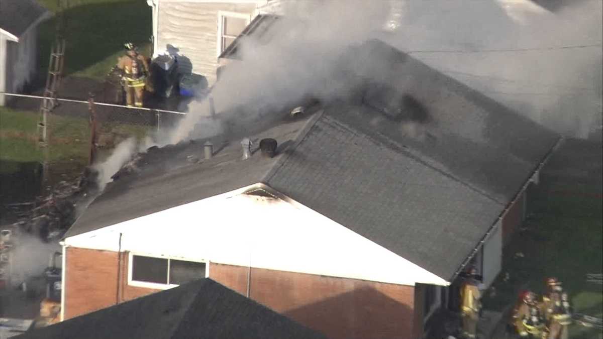 IMAGES Fire crews respond to house fire on Kendall Lane