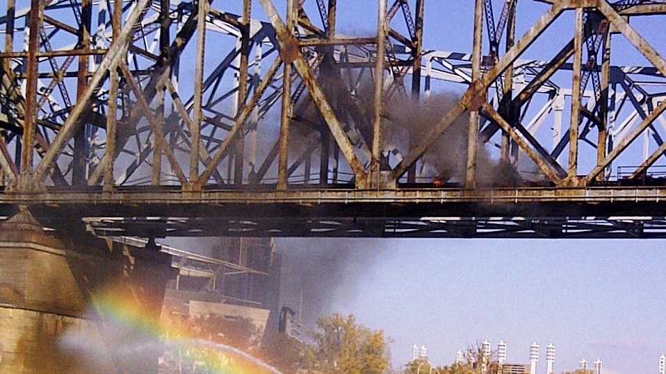 Crews battle fire on railroad bridge over Ohio River