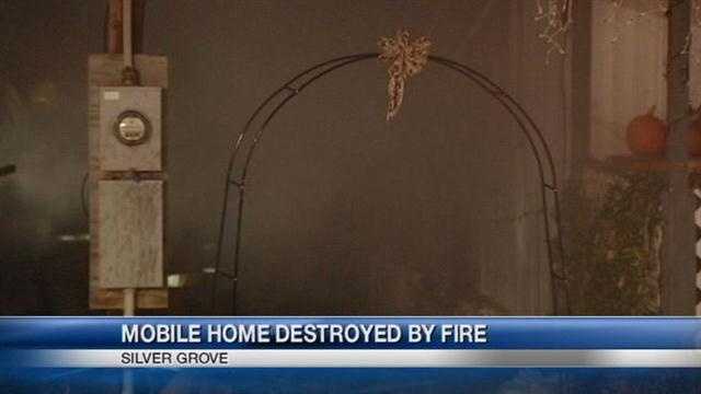 Images: 1 home destroyed, 2 damaged in mobile home park fire