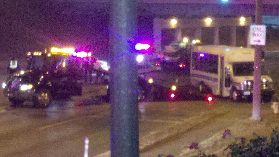 2 hurt when car, bus collide
