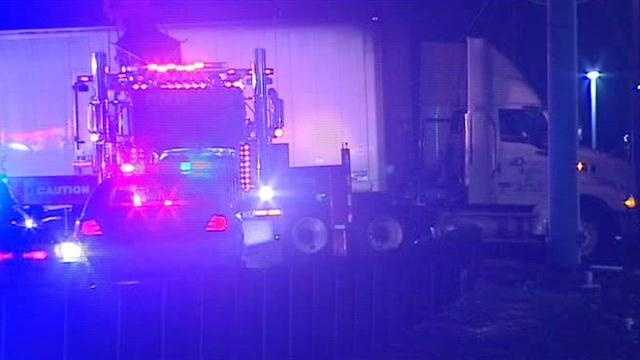 Images: Car runs under semi on U.S. 50