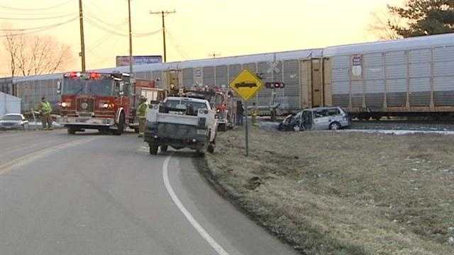 A man calls police with concerns about a drivers actions then watches in horror and that driver collides with a train.