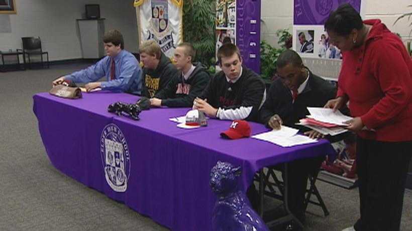 Five high school athletes sign their National Letters of Intent to play college athletics at Elder.