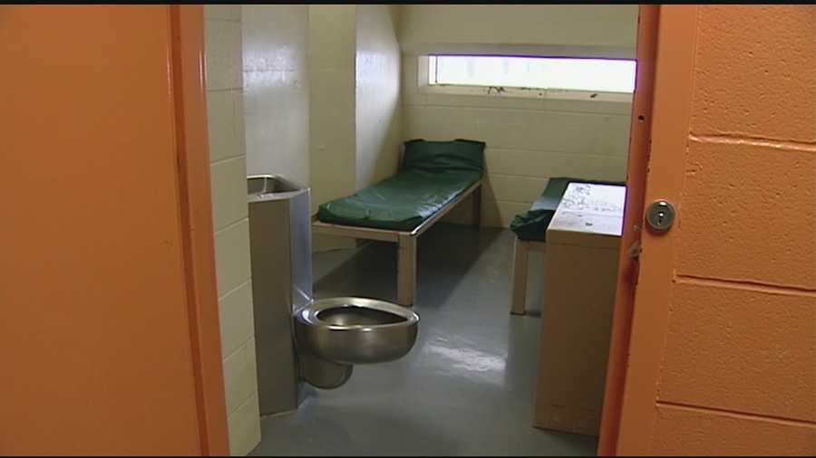 A civil rights watchdog is calling for an end to some fees inmates pay for their stay in jail.