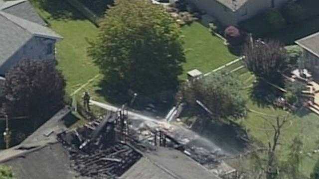 Images: Small plane crashes into Indiana home