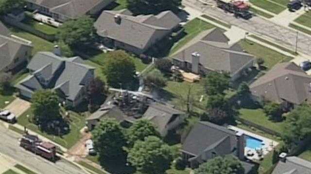 Images: Small plane crashes into Indiana home