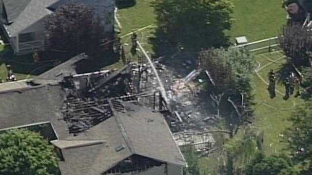 Images: Small plane crashes into Indiana home