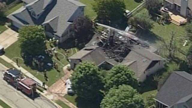 Images: Small plane crashes into Indiana home