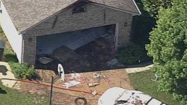 Images: Small plane crashes into Indiana home