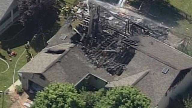 Images: Small plane crashes into Indiana home