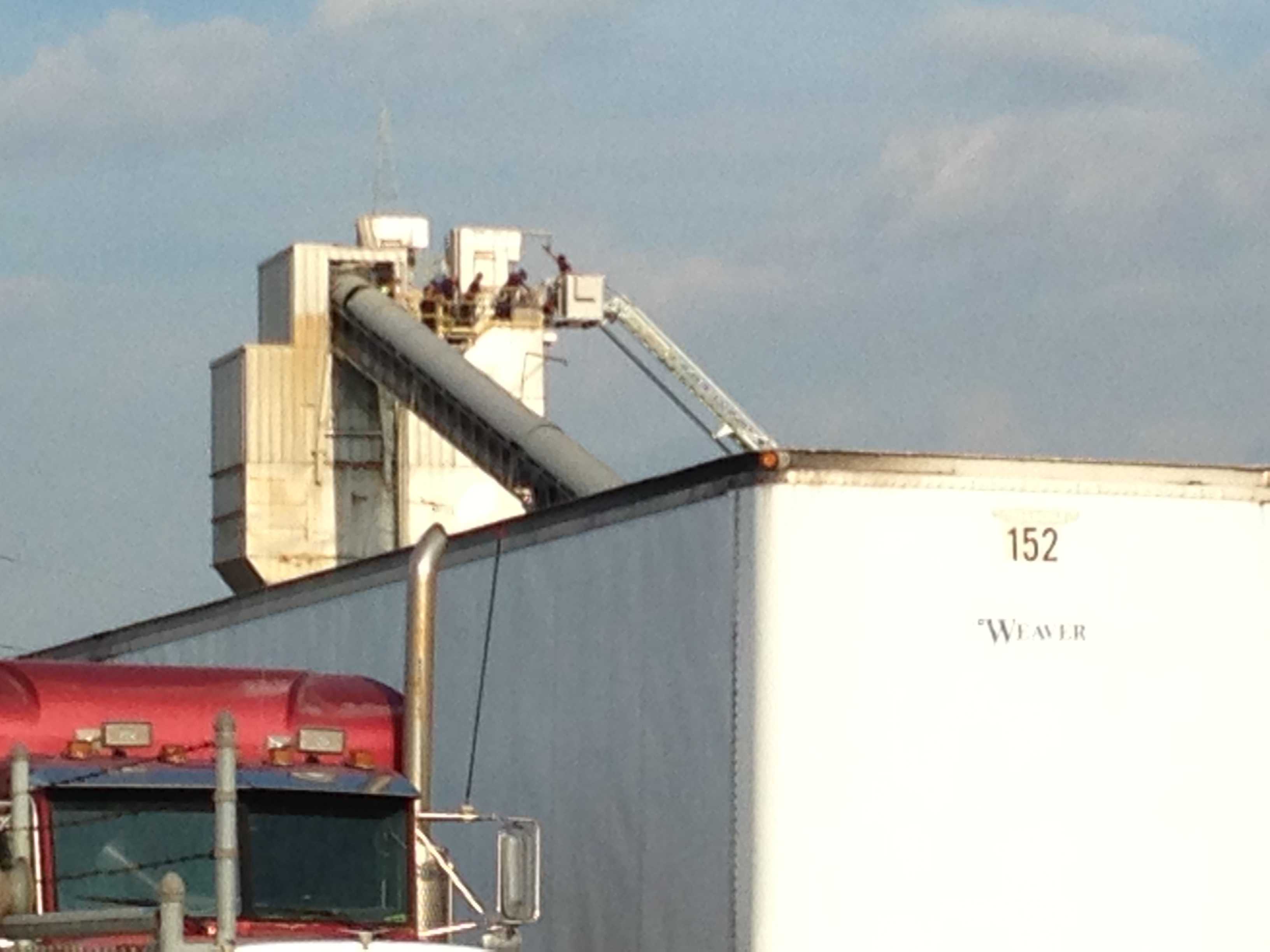 silo falls on tractor during demo