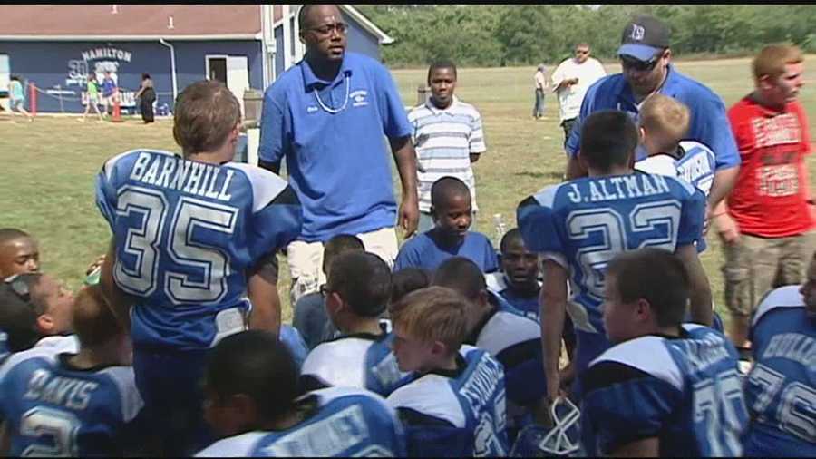 A Hamilton youth football team honored its slain coach Saturday.