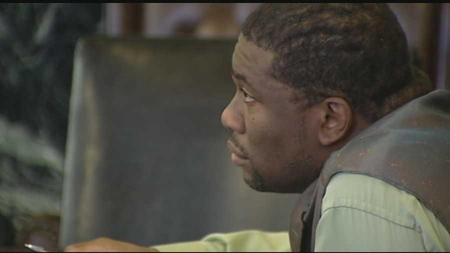 A woman who accuses a man of posing as a police officer and raping her took the stand facing him in court Tuesday.