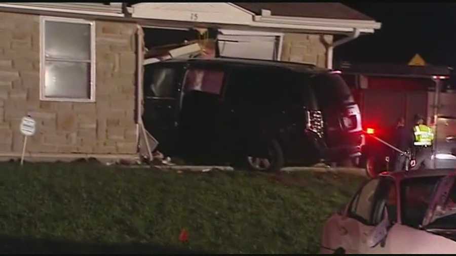 Several people were hurt when a minivan crashed into an apartment building late Wednesday.