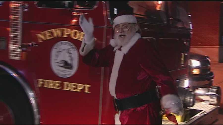 Santa rode the fire truck to deliver toys to girls and boys who might not otherwise receive gifts. For 20 years, the Newport firefighters have been helping Santa on Christmas Eve.