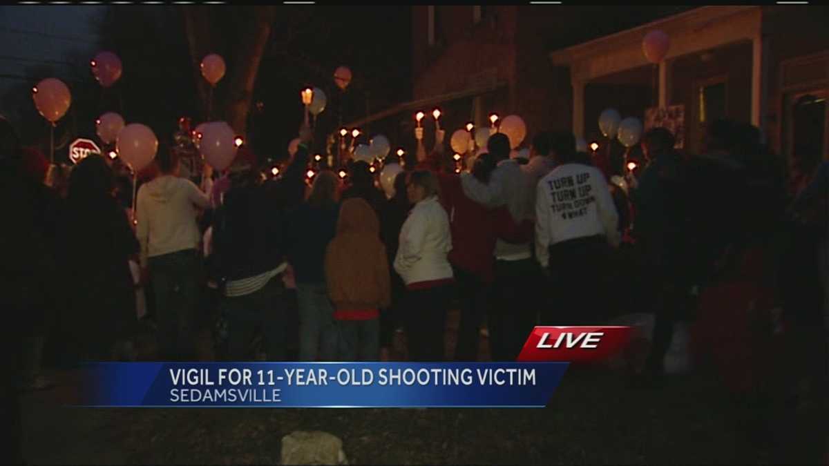Family, friends gather for vigil of 11-year-old shot, killed Sunday