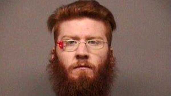 Man charged with murder after roommate found dead