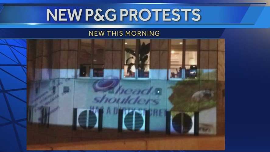 Protest message projected onto P&G building overnight