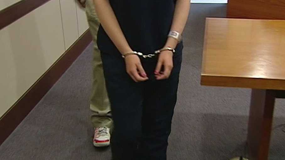 Tearful teen girl in court after bank robbery charge
