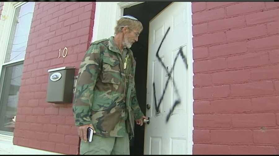 A swastika spray painted on the front door of a Jewish family has them intimidated to the point of moving out of their Price Hill neighborhood.