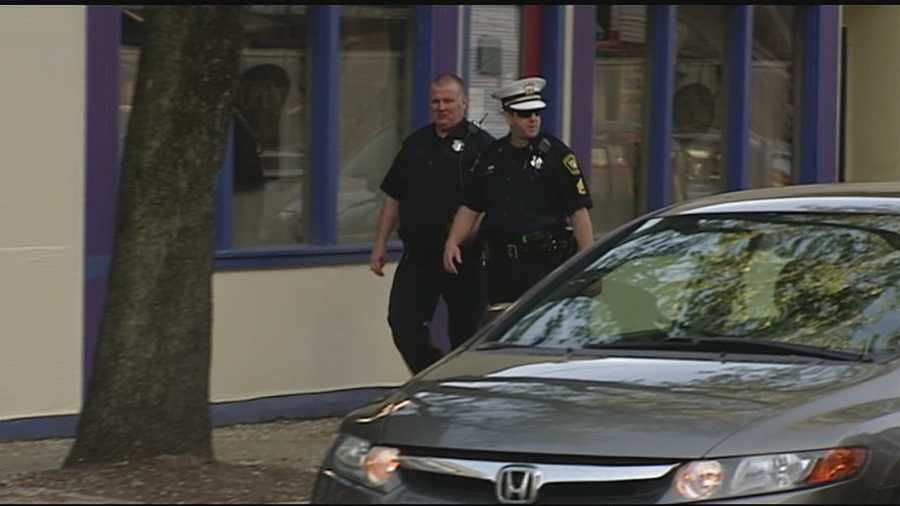 Two businesses were boarded up and are now property of the Cincinnati Police Department after a raid Thursday.