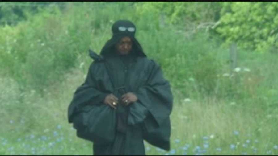 The woman in black's wandering has led to lots of wondering as she passed through Highland County dressed in all black with a robe and head covering, apparently on some unknown mission.