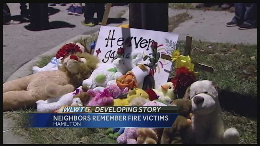 Friends and neighbors on Franklin Street gathered Friday night to remember the three children killed in a house fire.