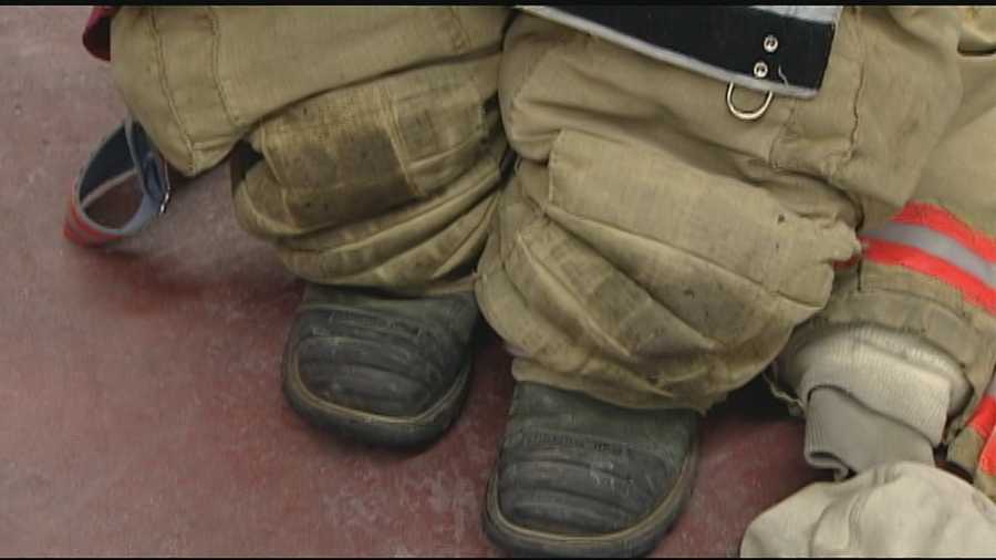 The gear firefighters wear to protect them from the flames, also protects them from that water