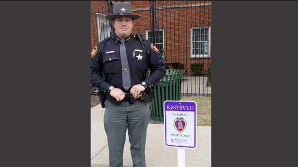 Sheriff’s Deputy Danny Ruck at one of the parking spaces