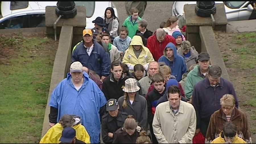 Despite the rain and storms, people lined up to pray the steps at Holy Cross Immaculata Church in Mount Adams.