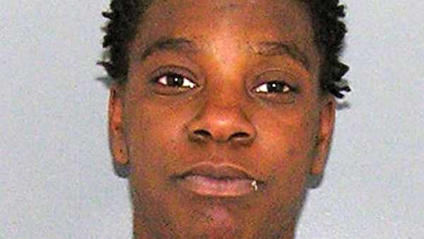 Woman accused of robbing convenience store at gunpoint