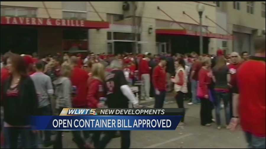 Ohio's governor has signed a bill to let some cities create outdoor refreshment areas where revelers could walk outside with open containers of alcohol.