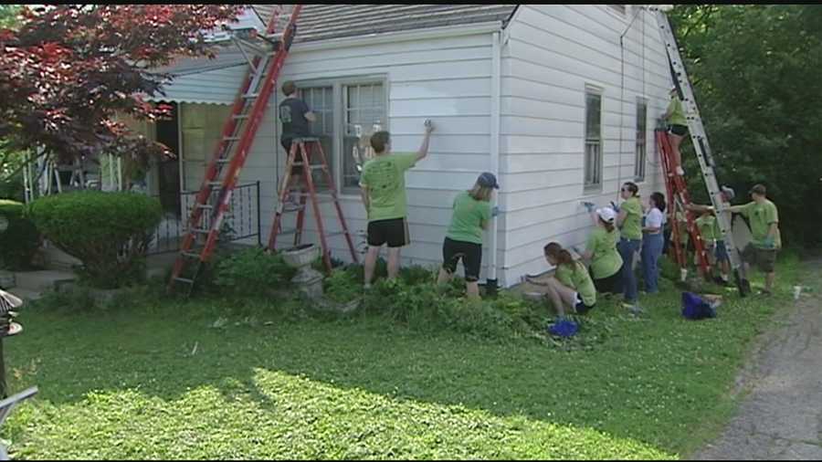 Volunteers brushed, taped and painted the town one house at a time. More than 35 houses got a fresh coat and a touch up at the 14th annual Paint the Town event on Saturday.