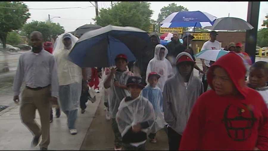 The group said rain does not deter violence, nor would it deter them. It was a gathering of men to reclaim as they say, their place in their community.