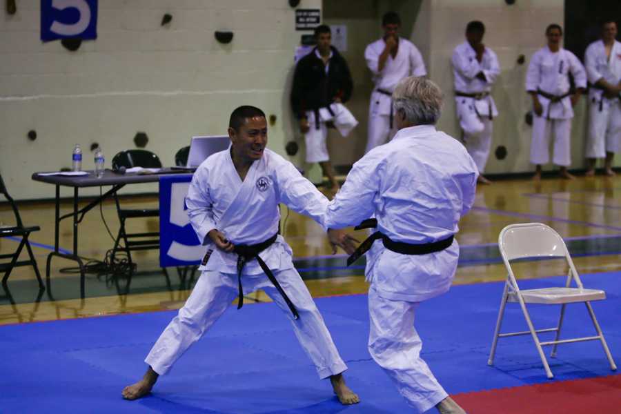 copy kim katate pics from Vinson B. Lewis (1).jpg Friends remember Kim as a senei at Japanese Karate-do in Symmes Township. His students place flowers at the door of the Karate studio.Watch this story