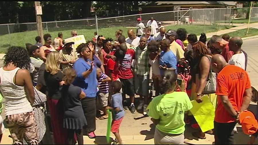 Residents in Avondale held a march Saturday after a little girl was caught in gunfire.