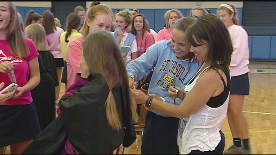 St. Ursula Academy students took an unusual lunch break Tuesday. More than 50 St. Ursula students headed to the school gym to get their hair cut. Their hair will be turned into beautiful wigs for women battling cancer.